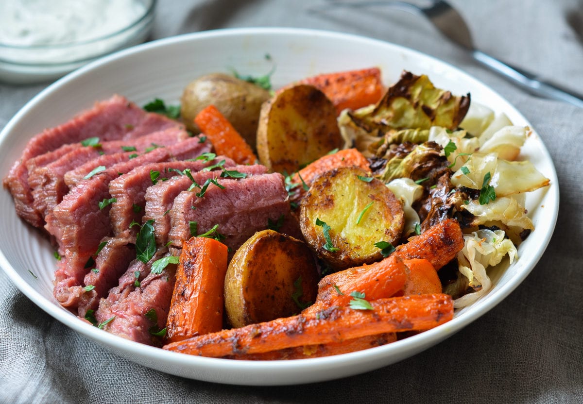 Roasted Corned Beef and Cabbage with Carrots, Potatoes & Horseradish Cream Sauce